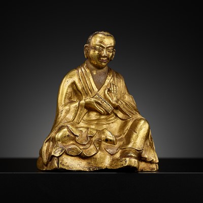 Lot 283 - A GILT-BRONZE FIGURE OF THE ARHAT PANTHAKA, TIBET, 17TH-18TH CENTURY