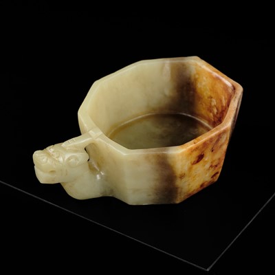 Lot 167 - AN OCTAGONAL CELADON AND RUSSET JADE ‘DRAGON’ CUP, 17TH-18TH CENTURY