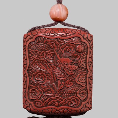 Lot 5 - A FINE TSUISHU FOUR-CASE LACQUER INRO WITH DRAGONS CHASING A FLAMING PEARL