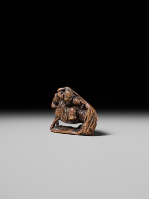 Lot 210 - SHOUNSAI JORYU: A WOOD NETSUKE OF KWANYU ON HORSEBACK