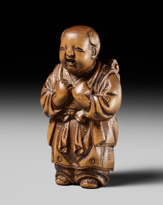 Lot 479 - KOJITSU: A CHARMING WOOD NETSUKE OF A KARAKO WITH SCROLLS