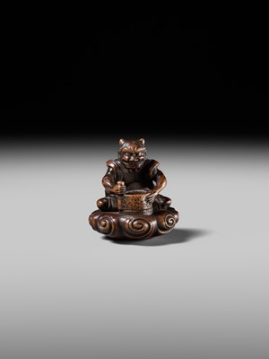 Lot 227 - HOSHUNSAI MASAYUKI: A FINE WOOD NETSUKE OF A RAIJIN ON A CLOUD