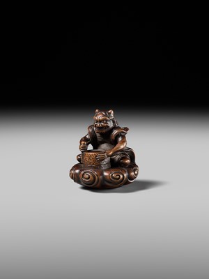 Lot 227 - HOSHUNSAI MASAYUKI: A FINE WOOD NETSUKE OF A RAIJIN ON A CLOUD