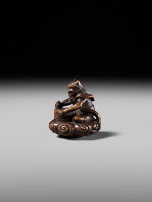 Lot 227 - HOSHUNSAI MASAYUKI: A FINE WOOD NETSUKE OF A RAIJIN ON A CLOUD