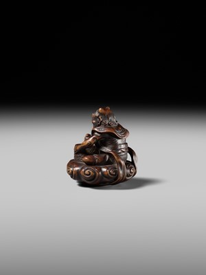 Lot 227 - HOSHUNSAI MASAYUKI: A FINE WOOD NETSUKE OF A RAIJIN ON A CLOUD