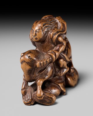 Lot 208 - SHOZAN: AN EARLY EDO SCHOOL WOOD NETSUKE OF A WARRIOR ON HORSEBACK