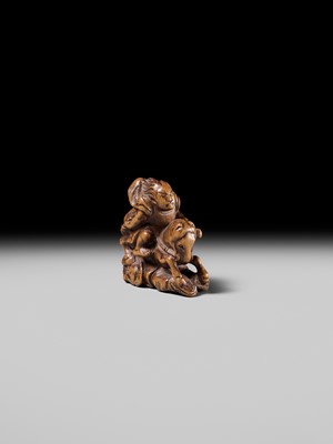 Lot 208 - SHOZAN: AN EARLY EDO SCHOOL WOOD NETSUKE OF A WARRIOR ON HORSEBACK