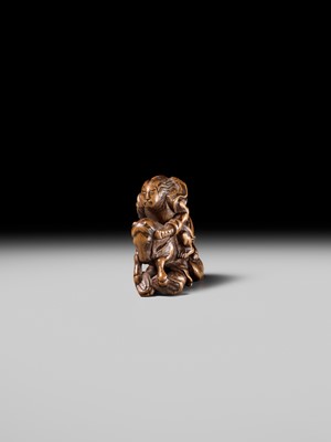 Lot 208 - SHOZAN: AN EARLY EDO SCHOOL WOOD NETSUKE OF A WARRIOR ON HORSEBACK