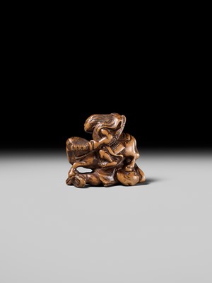 Lot 208 - SHOZAN: AN EARLY EDO SCHOOL WOOD NETSUKE OF A WARRIOR ON HORSEBACK