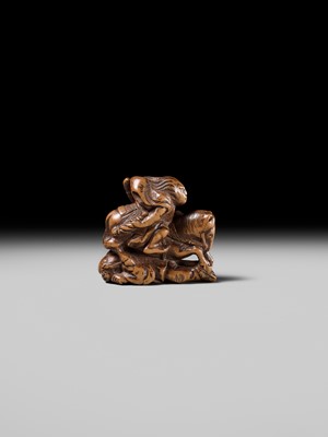 Lot 208 - SHOZAN: AN EARLY EDO SCHOOL WOOD NETSUKE OF A WARRIOR ON HORSEBACK