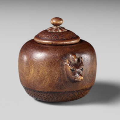 Lot 473 - TOMOMASA: A WOOD NETSUKE DEPICTING THE BUNBUKU CHAGAMA