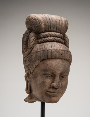 Lot 1099 - A STONE HEAD OF A DEITY, VIETNAM, 19th CENTURY