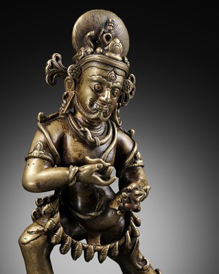 Lot 14 - A COPPER AND SILVER-INLAID BRONZE OF VAJRAPANI, TIBET, 15TH-16TH CENTURY