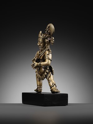 Lot 14 - A COPPER AND SILVER-INLAID BRONZE OF VAJRAPANI, TIBET, 15TH-16TH CENTURY