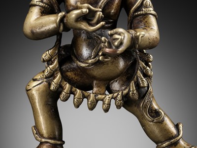 Lot 14 - A COPPER AND SILVER-INLAID BRONZE OF VAJRAPANI, TIBET, 15TH-16TH CENTURY