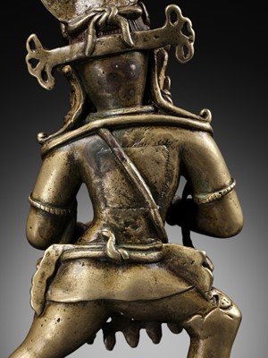 Lot 14 - A COPPER AND SILVER-INLAID BRONZE OF VAJRAPANI, TIBET, 15TH-16TH CENTURY