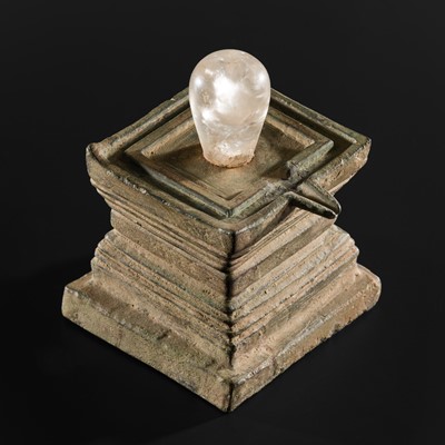 Lot 682 - A ROCK CRYSTAL LINGA AND BRONZE YONI, ANGKOR PERIOD