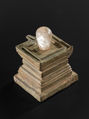 Lot 682 - A ROCK CRYSTAL LINGA AND BRONZE YONI, ANGKOR PERIOD