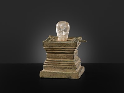 Lot 682 - A ROCK CRYSTAL LINGA AND BRONZE YONI, ANGKOR PERIOD