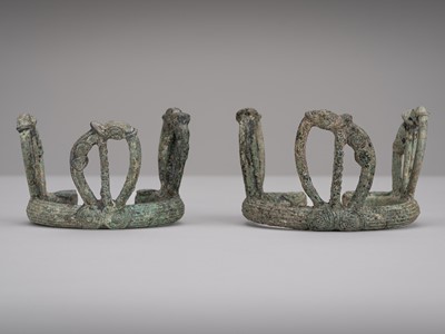 Lot 1094 - A RARE PAIR OF BRONZE BANGLES, DONG SON CULTURE