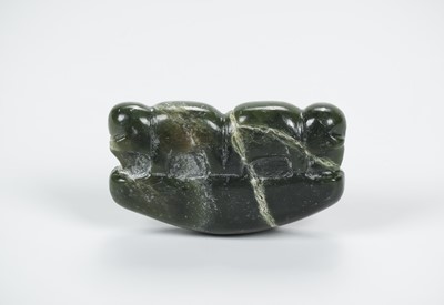 Lot 2176 - A BACTRIAN SERPENTINE AMULET WITH ELEPHANTS, c. 2500 YEARS OLD