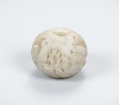 Lot 2178 - A LARGE BACTRIAN STONE BEAD WITH ANIMALS