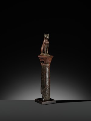 Lot 35 - A FINE BRONZE FIGURE OF A CAT ON A COLUMN, BASTET, LATE PERIOD