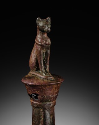 Lot 35 - A FINE BRONZE FIGURE OF A CAT ON A COLUMN, BASTET, LATE PERIOD