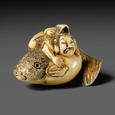 Lot 450 - A FINE IVORY NETSUKE OF EBISU ON A BLOWFISH (FUGU)