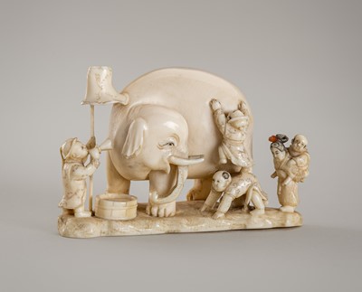 Lot 1312 - MASATSUGU: AN IVORY OKIMONO-NETSUKE OF A GROUP OF BOYS WITH AN ELEPHANT