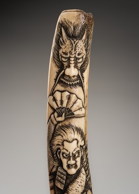 Lot 1171 - A SIGNED ANTLER KISERUZUTSU WITH WARRIORS