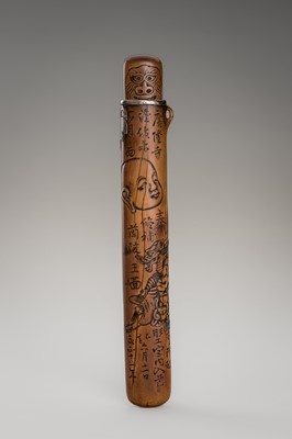 Lot 1185 - A SIGNED WOOD KISERUZUTSU WITH MASKS