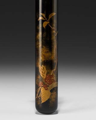 Lot 384 - A FINE BLACK LACQUERED KISERUZUTSU DEPICTING LOQUATS