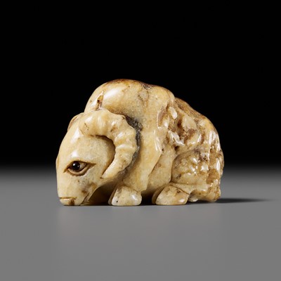 Lot 366 - LEE YOUNGREN: AN EXQUISITE FOSSILIZED SIBERIAN MAMMOTH TUSK NETSUKE OF A RAM