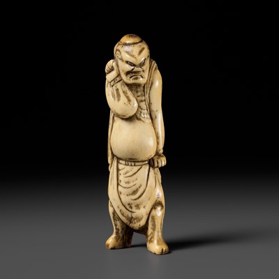 Lot 302 - AN ANTLER NETSUKE OF A NIO