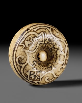 Lot 322 - OZAKI KOKUSAI: A RARE ANTLER MANJU NETSUKE