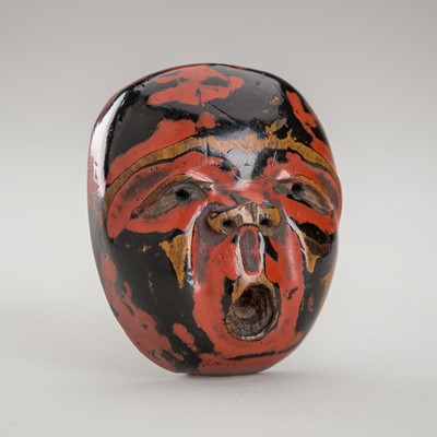 Lot 1219 - A NEGORO LACQUER NOH MASK NETSUKE