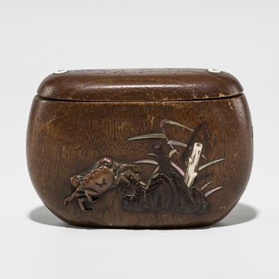 Lot 393 - DOSHO: A WOOD TONKOTSU DEPICTING A CRAB AND CUCKOO