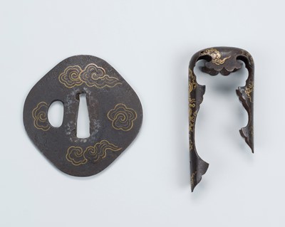 Lot 1498 - AN IRON TSUBA AND A MATCHING IRON KOJIRI WITH SWIRLING CLOUDS