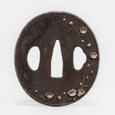 Lot 1465 - AN IRON TSUBA DEPICTING PRUNUS BLOSSOMS