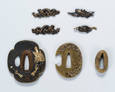 Lot 1468 - A MIXED LOT OF SWORD FITTINGS WITH TWO TSUBA, FOUR MENUKI AND A FUCHI