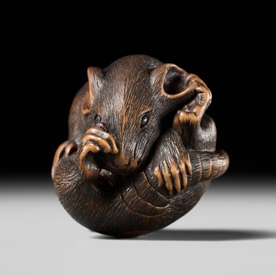 Lot 148 - MASATADA: A FINE WOOD NETSUKE OF A COILED RAT