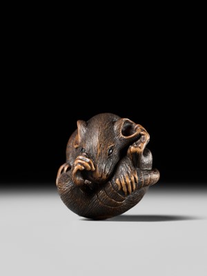 Lot 148 - MASATADA: A FINE WOOD NETSUKE OF A COILED RAT