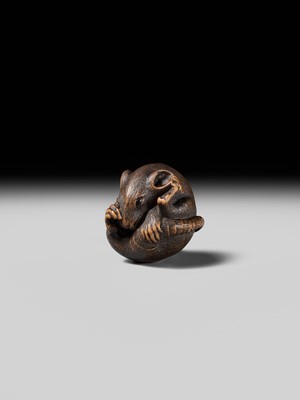 Lot 148 - MASATADA: A FINE WOOD NETSUKE OF A COILED RAT