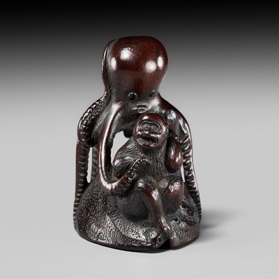 Lot 242 - A FINE WOOD NETSUKE OF A MONKEY AND OCTOPUS ON AN AWABI SHELL