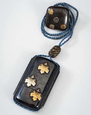 Lot 255 - A SMALL MIXED METAL TWO-CASE INRO DEPICTING KIRI CRESTS