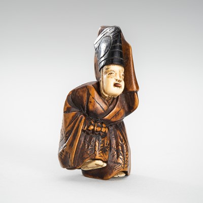 Lot 1600 - AN INLAID WOOD NETSUKE OF A SAMBASO DANCER