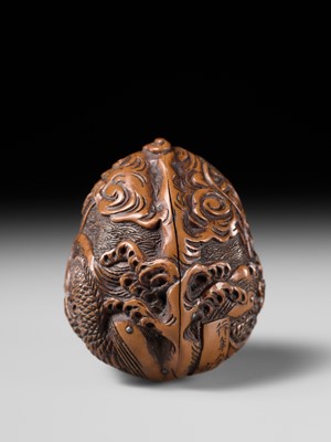 Lot 334 - TORYUSAI KOZAN: A SUPERB KURUMI (WALNUT) NETSUKE OF A DRAGON, DATED 1848