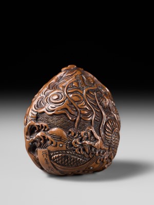 Lot 334 - TORYUSAI KOZAN: A SUPERB KURUMI (WALNUT) NETSUKE OF A DRAGON, DATED 1848