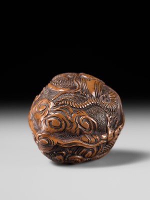 Lot 334 - TORYUSAI KOZAN: A SUPERB KURUMI (WALNUT) NETSUKE OF A DRAGON, DATED 1848